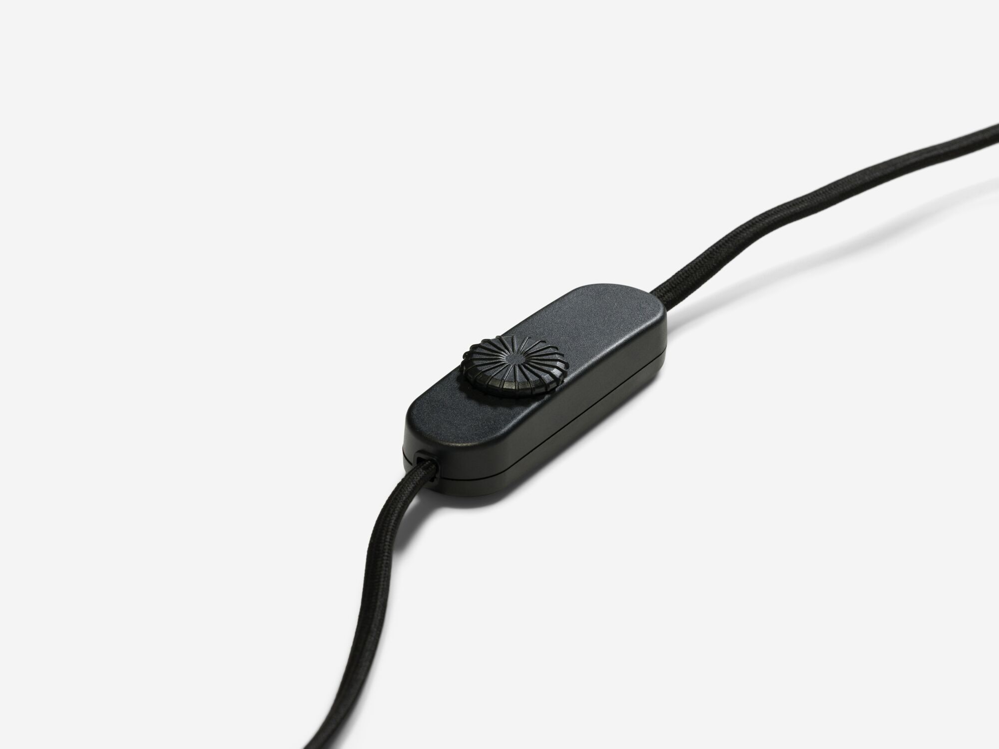 Detail view of black table lamp cord